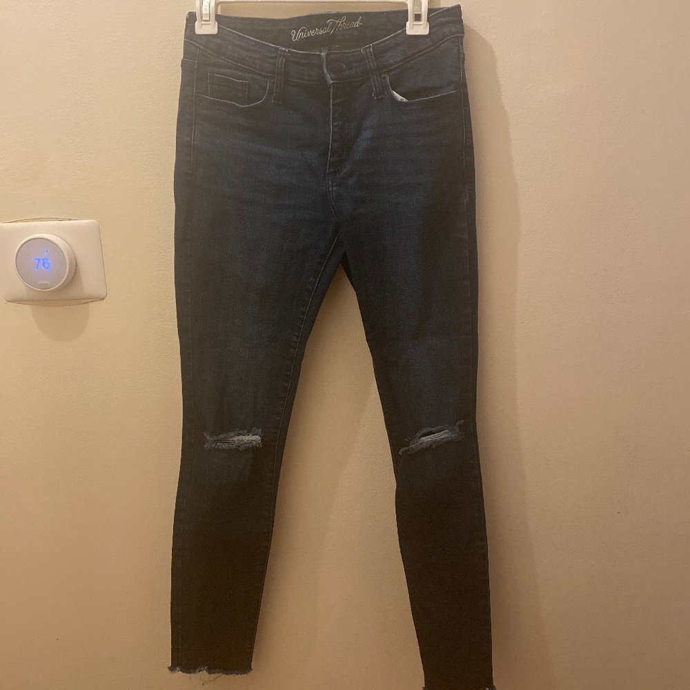 Women’s mid-rise distressed jeans